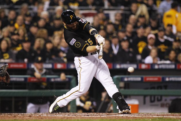 PITTSBURGH, PA - OCTOBER 01:  Russell Martin #55 of the Pittsburgh Pirates hits a single in the second inning against the San Francisco Giants during the National League Wild Card game at PNC Park on October 1, 2014 in Pittsburgh, Pennsylvania.  (Photo by Justin K. Aller/Getty Images)