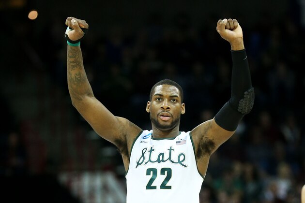 SPOKANE, WA - MARCH 22:  Branden Dawson #22 of the Michigan State Spartans celebrates in the second half against the Harvard Crimson during the Third Round of the 2014 NCAA Basketball Tournament at Spokane Veterans Memorial Arena on March 22, 2014 in Spokane, Washington.  (Photo by Stephen Dunn/Getty Images)
