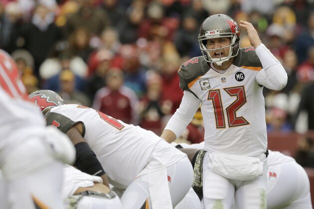 Tampa Bay Buccaneers quarterback Josh McCown (12) yells down the line during the second half of an NFL football game against the Washington Redskins in Landover, Md., Sunday, Nov. 16, 2014. (AP Photo/Patrick Semansky)