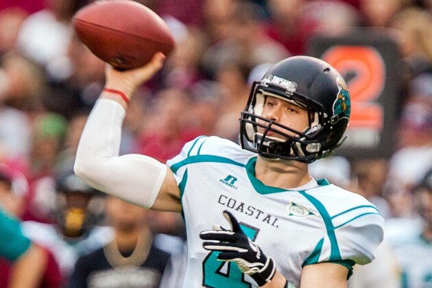 Nov 23, 2013; Columbia, SC, USA; Coastal Carolina Chanticleers quarterback Alex Ross passes against the South Carolina Gamecocks in the first half at Williams-Brice Stadium. Mandatory Credit: Jeff Blake-USA TODAY
