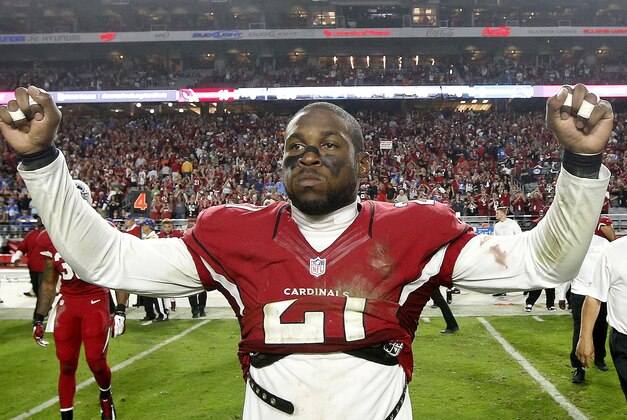 Arizona Cardinals' Patrick Peterson celebrates at the end of an NFL football game against the Detroit Lions Sunday, Nov. 16, 2014, in Glendale, Ariz. The Cardinals won 14-6. (AP Photo/Ross D. Franklin)