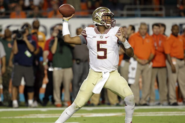 Florida State quarterback Jameis Winston (5) stands back to pass in the first half an NCAA college football game against Miami, Saturday, Nov. 15, 2014, in Miami Gardens, Fla. (AP Photo/Lynne Sladky)