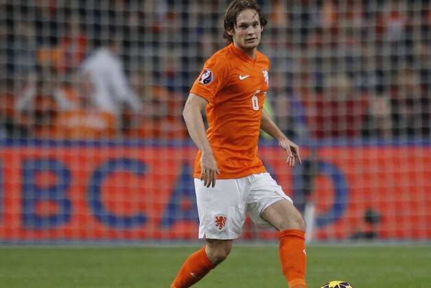 Netherlands' Daley Blind passes the ball during the Euro 2016 group A qualifying round soccer match between the Netherlands and Latvia at ArenA stadium in Amsterdam, Netherlands, Sunday, Nov. 16, 2014. (AP Photo/Peter Dejong)