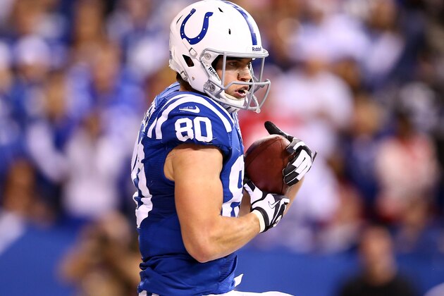 INDIANAPOLIS, IN - JANUARY 04:  Tight end Coby Fleener #80 of the Indianapolis Colts catches a touchdown pass in the third quarter against the Kansas City Chiefs during a Wild Card Playoff game at Lucas Oil Stadium on January 4, 2014 in Indianapolis, Indiana.  (Photo by Andy Lyons/Getty Images)