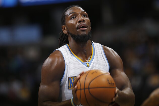 Denver Nuggets forward Kenneth Faried sets for free throw against the Detroit Pistons in the fourth quarter of the Nuggets' 89-79 victory in an NBA basketball game in Denver on Wednesday, Oct. 29, 2014. (AP Photo/David Zalubowski)