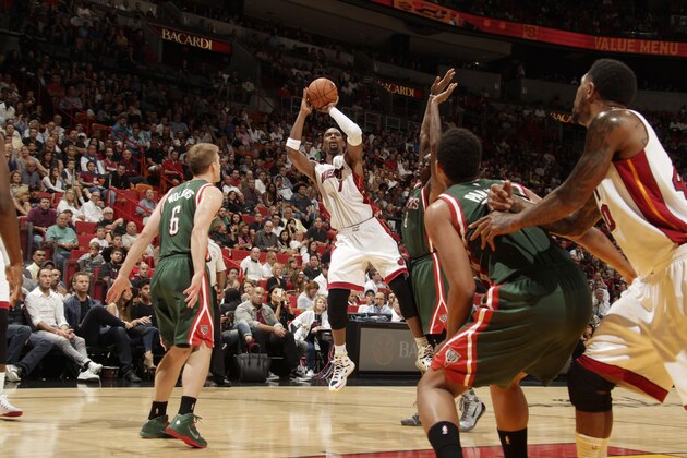 MIAMI, FL - NOVEMBER 16:  Chris Bosh #1 of the Miami Heat shoots the ball against the Milwaukee Bucks during the game on November 16, 2014 at AmericanAirlines Arena in Miami, Florida. NOTE TO USER: User expressly acknowledges and agrees that, by downloading and or using this Photograph, user is consenting to the terms and conditions of the Getty Images License Agreement. Mandatory Copyright Notice: Copyright 2014 NBAE (Photo by Issac Baldizon/NBAE via Getty Images)