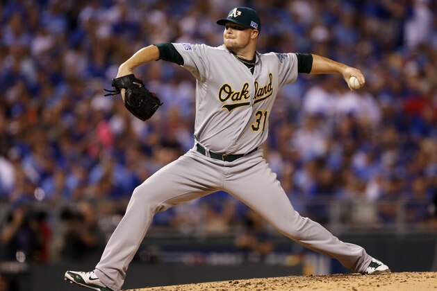 KANSAS CITY, MO - SEPTEMBER 30:  Jon Lester #31 of the Oakland Athletics pitches in the second inning against the Kansas City Royals during the American League Wild Card game at Kauffman Stadium on September 30, 2014 in Kansas City, Missouri.  (Photo by Ed Zurga/Getty Images)