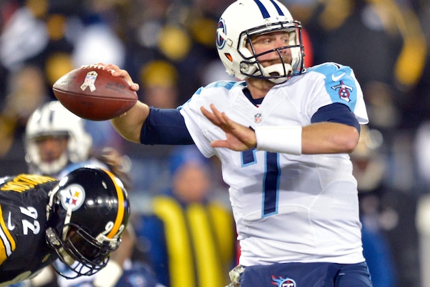 Nov 17, 2014; Nashville, TN, USA; Tennessee Titans quarterback Zach Mettenberger (7) passes against Pittsburgh Steelers linebacker James Harrison (92) during the first half at LP Field. Mandatory Credit: Jim Brown-USA TODAY Sports
