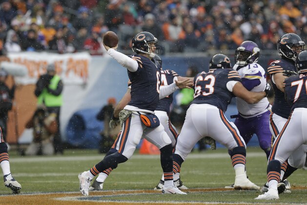 Chicago Bears quarterback Jay Cutler (6) passes against the Minnesota Vikings during the first half of an NFL football game Sunday, Nov. 16, 2014 in Chicago. (AP Photo/Nam Y. Huh)