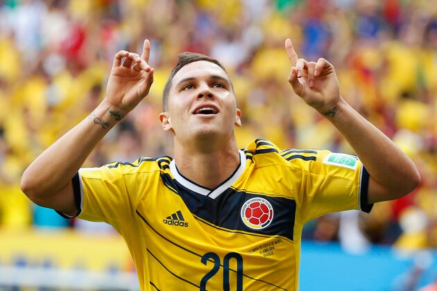 BRASILIA, BRAZIL - JUNE 19:  Juan Fernando Quintero of Colombia celebrates after scoring his team's second goal during the 2014 FIFA World Cup Brazil Group C match between Colombia and Cote D'Ivoire at Estadio Nacional on June 19, 2014 in Brasilia, Brazil.  (Photo by Gabriel Rossi/Getty Images)
