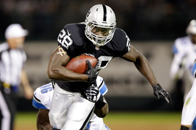 OAKLAND, CA - AUGUST 15:  Running back Latavius Murray #28 of the Oakland Raiders carries the ball during their preseason game against the Detriot Lions at O.co Coliseum on August 15, 2014 in Oakland, California.  (Photo by Ezra Shaw/Getty Images)