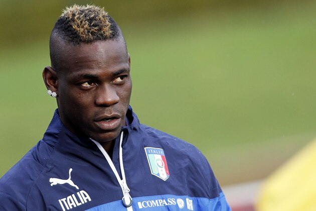 Italian national soccer team's Mario Balotelli attends a training session with the team at the Coverciano Training Center, near Florence, central Italy, Monday, Nov.10, 2014. Italy will play Croatia in Milan on Sunday in a Euro2016, Group H, qualifying round soccer match. (AP Photo/Fabrizio Giovannozzi)