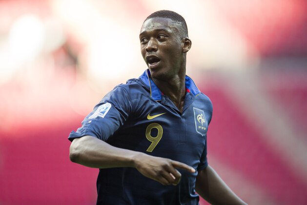 France's Yaya Sanogo celebrates scoring a goal during the Under-20 World Cup Group A soccer match between France and Ghana, in Istanbul, Turkey, Friday, June 21, 2013. (AP Photo/Gero Breloer)