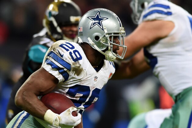 Dallas Cowboys running back DeMarco Murray (29) runs the ball against the Jacksonville Jaguars during the second half of an NFL football game at Wembley Stadium, London, Sunday, Nov. 9, 2014.  (AP Photo/Tim Ireland)