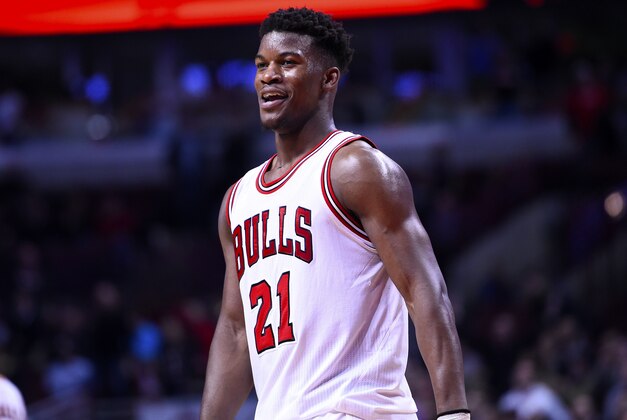 Nov 4, 2014; Chicago, IL, USA; Chicago Bulls guard Jimmy Butler (21) reacts after the game against the Orlando Magic at the United Center. Chicago Bulls defeat the Orlando Magic 98-90. Mandatory Credit: Mike DiNovo-USA TODAY Sports