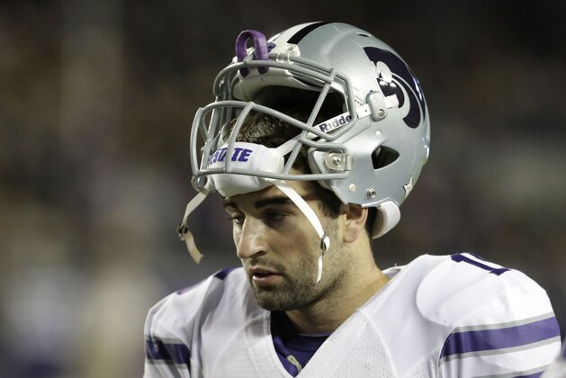 Kansas State quarterback Jake Waters walks the sidelines during the second half of an NCAA college football game against TCU Saturday, Nov. 8, 2014, in Fort Worth, Texas. (AP Photo/LM Otero)