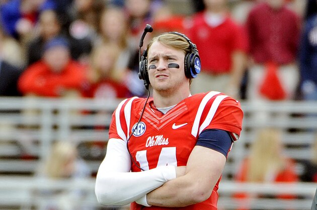 Mississippi quarterback Bo Wallace (14) watches on during the second half of an NCAA college football game against Presbyterian in Oxford, Miss., Saturday, Nov. 8, 2014. No. 12 Mississippi won 48-0.  (AP Photo/Thomas Graning)