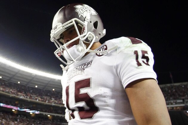 Mississippi State quarterback Dak Prescott (15) walks off the field after loosing to Alabama 25-20 in an NCAA college football game on Saturday, Nov. 15, 2014, in Tuscaloosa, Ala. (AP Photo/Butch Dill)