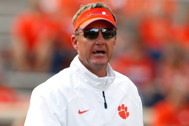 CLEMSON, SC - OCTOBER 11: Offensive Coordinator Chad Morris of the Clemson Tigers looks on during warm ups prior to the game against the Louisville Cardinals at Memorial Stadium on October 11, 2014 in Clemson, South Carolina. (Photo by Tyler Smith/Getty Images)