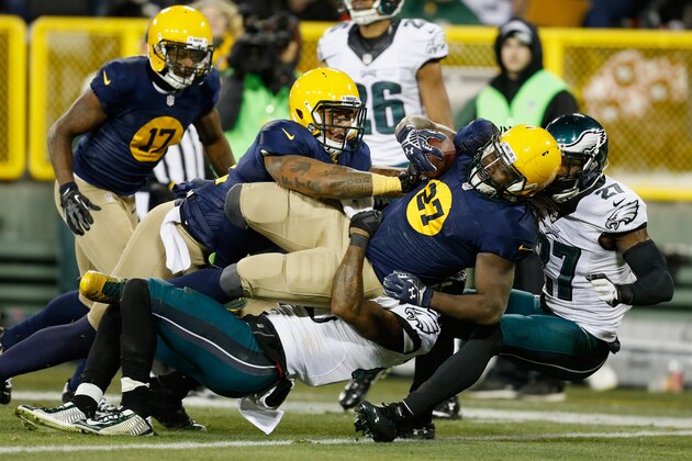 GREEN BAY, WI - NOVEMBER 16:  Eddie Lacy #27 of the Green Bay Packers scores a touchdown during the fourth quarter of the game against the Philadelphia Eagles at Lambeau Field on November 16, 2014 in Green Bay, Wisconsin.  (Photo by Mike Zarrilli/Getty Images)