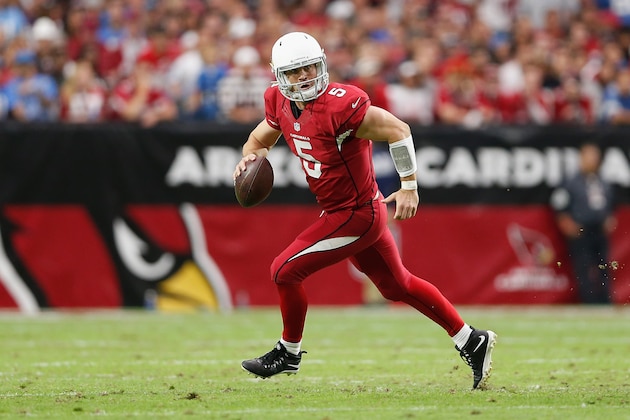 GLENDALE, AZ - NOVEMBER 16:  Quarterback Drew Stanton #5 of the Arizona Cardinals scrambles with the football during the NFL game against the Detroit Lions at the University of Phoenix Stadium on November 16, 2014 in Glendale, Arizona.  The Cardinals defeated the Lions 14-6.  (Photo by Christian Petersen/Getty Images)