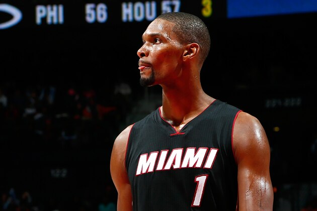 ATLANTA, GA - NOVEMBER 14:  Chris Bosh #1 of the Miami Heat reacts after a turnover to the Atlanta Hawks at Philips Arena on November 14, 2014 in Atlanta, Georgia.  NOTE TO USER: User expressly acknowledges and agrees that, by downloading and or using this photograph, User is consenting to the terms and conditions of the Getty Images License Agreement.  (Photo by Kevin C. Cox/Getty Images)