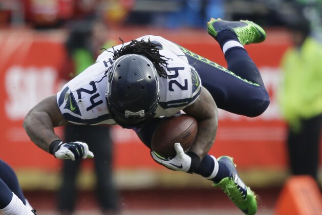 Seattle Seahawks running back Marshawn Lynch (24) stumbles in the first half of an NFL football game against the Kansas City Chiefs in Kansas City, Mo., Sunday, Nov. 16, 2014. (AP Photo/Charlie Neibergall) Seattle Seahawks running back Marshawn Lynch (24) stumbles in the first half of an NFL football game against the Kansas City Chiefs in Kansas City, Mo., Sunday, Nov. 16, 2014. (AP Photo/Charlie Neibergall)