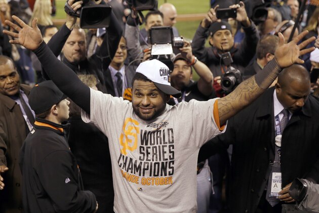 San Francisco Giants' Pablo Sandoval   celebrates after Game 7 of baseball's World Series against the Kansas City Royals Wednesday, Oct. 29, 2014, in Kansas City, Mo. The Giants won 3-2 to win the series. (AP Photo/Matt Slocum)