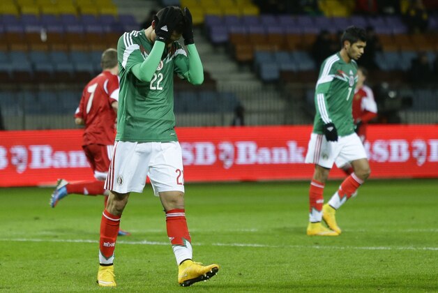 Mexico's Paul Aguilar reacts during their international friendly soccer match against Belarus at Borisov-Arena stadium in Borisov, Belarus, Tuesday, Nov. 18, 2014. (AP Photo/Sergei Grits)