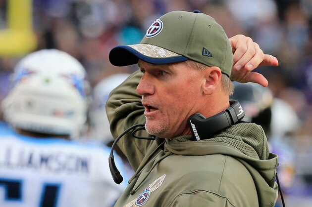 BALTIMORE, MD - NOVEMBER 09: Head coach Ken Whisenhunt of the Tennessee Titans gestures to Line Judge Mike Spainer #90 in the second half of a game against the Baltimore Ravens at M&T Bank Stadium on November 9, 2014 in Baltimore, Maryland.  (Photo by Rob Carr/Getty Images)