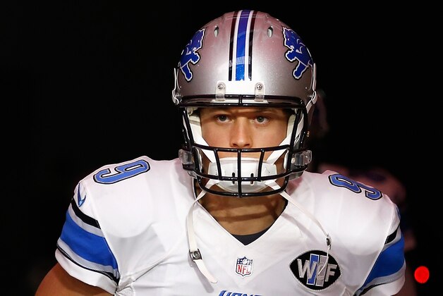 GLENDALE, AZ - NOVEMBER 16:  Quarterback Matthew Stafford #9 of the Detroit Lions runs out onto the field before the NFL game against the Arizona Cardinals at the University of Phoenix Stadium on November 16, 2014 in Glendale, Arizona.The Cardinals defeated the Lions 14-6.  (Photo by Christian Petersen/Getty Images)