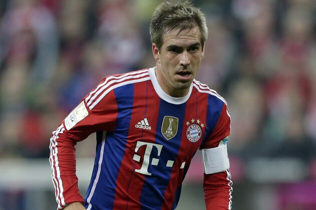 Bayern's Philipp Lahm controls the ball during the German first division Bundesliga soccer match between FC Bayern and Borussia Dortmund in the Allianz Arena in Munich, Germany, on Saturday, Nov. 1, 2014. (AP Photo/Matthias Schrader)
