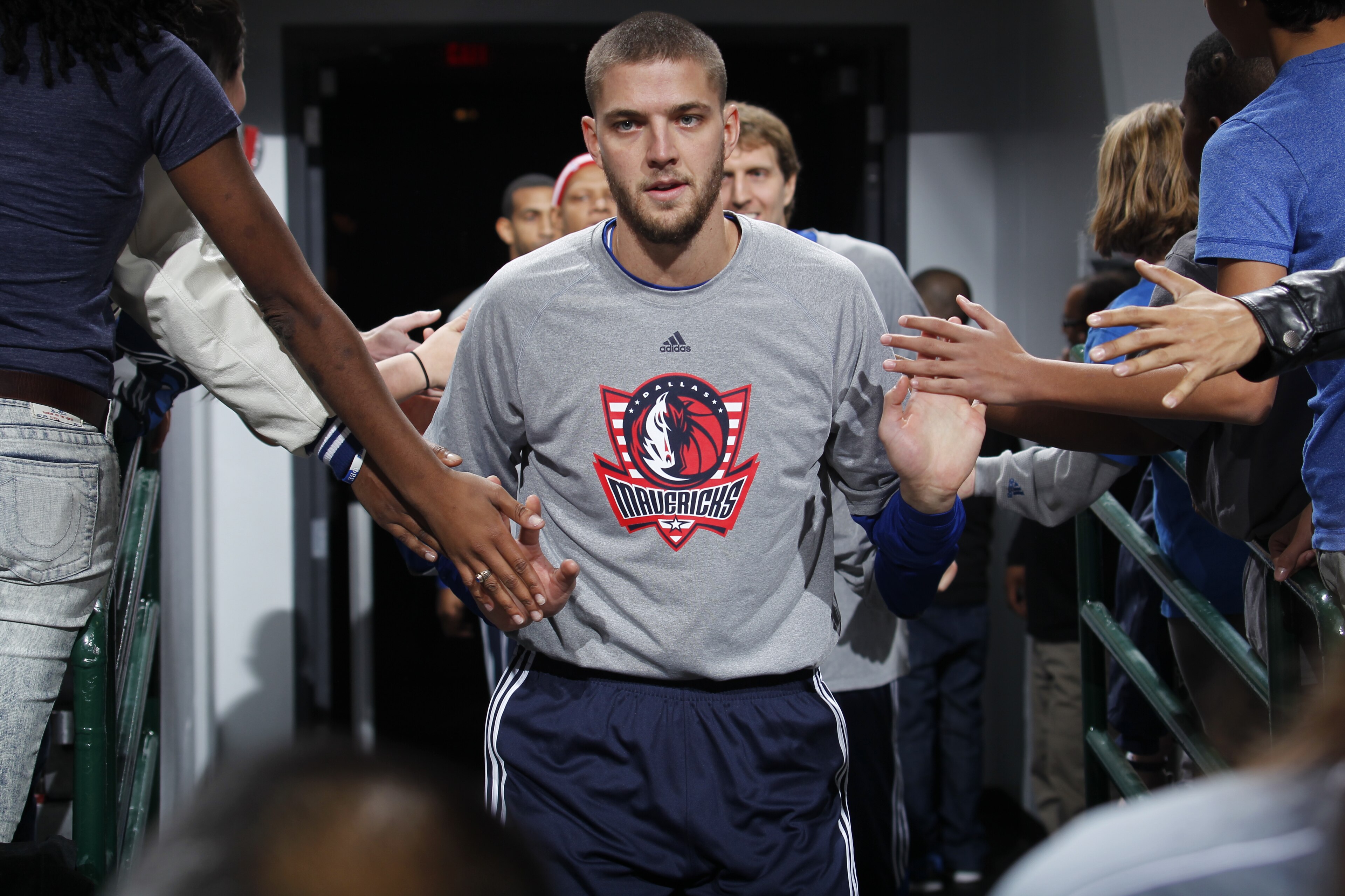 DALLAS, TX - NOVEMBER 11: Chandler Parsons #25 and the Dallas Mavericks take the court wearing special edition Veterans Day shirts against the Sacramento Kings on November 11, 2014 at the American Airlines Center in Dallas, Texas. NOTE TO USER: User expressly acknowledges and agrees that, by downloading and or using this photograph, User is consenting to the terms and conditions of the Getty Images License Agreement. Mandatory Copyright Notice: Copyright 2014 NBAE (Photo by Glenn James/NBAE via Getty Images)
