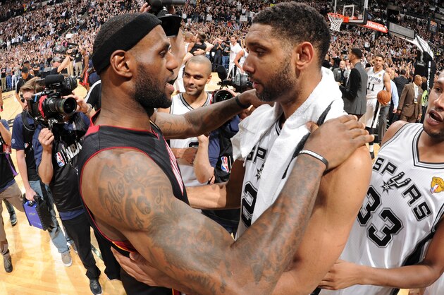 SAN ANTONIO, TX - JUNE 15: LeBron James #6 of the Miami Heat and Tim Duncan #21 of the San Antonio Spurs embrace after the San Antonio Spurs victory in Game Five and winning the 2014 NBA Finals between the Miami Heat and San Antonio Spurs at AT&T Center on June 15, 2014 in San Antonio, Texas. NOTE TO USER: User expressly acknowledges and agrees that, by downloading and/or using this photograph, user is consenting to the terms and conditions of the Getty Images License Agreement.  Mandatory Copyright Notice: Copyright 2014 NBAE (Photo by Andrew D Bernstein/NBAE via Getty Images)