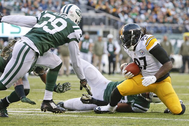 Pittsburgh Steelers running back LeGarrette Blount (27) is tackled by New York Jets' Quinton Coples as Jets' Antonio Allen (39) closes in near the goal line during the second half of an NFL football game Sunday, Nov. 9, 2014, in East Rutherford, N.J. (AP Photo/Kathy Willens)