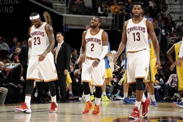 CLEVELAND, OH - OCTOBER 5:  LeBron James #23, Kyrie Irving #2 and Tristan Thompson #13 of the Cleveland Cavaliers walk off the court during a break in the action against the Maccabi Tel Aviv at The Quicken Loans Arena on October 16, 2014 in Cleveland, Ohio. NOTE TO USER: User expressly acknowledges and agrees that, by downloading and/or using this Photograph, user is consenting to the terms and conditions of the Getty Images License Agreement. Mandatory Copyright Notice: Copyright 2014 NBAE (Photo by David Liam Kyle/NBAE via Getty Images)