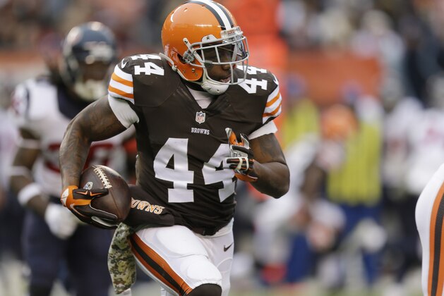 Cleveland Browns running back Ben Tate runs the ball against the Houston Texans in the third quarter of an NFL football game Sunday, Nov. 16, 2014, in Cleveland. (AP Photo/Tony Dejak)