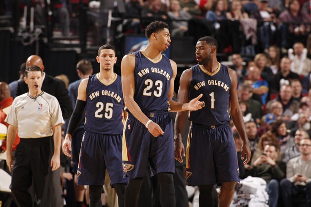 PORTLAND, OR - NOVEMBER 17: Anthony Davis #23, Tyreke Evans #1 and Austin Rivers #25 of the New Orleans Pelicans during the game on November 17, 2014 at the Moda Center Arena in Portland, Oregon. NOTE TO USER: User expressly acknowledges and agrees that, by downloading and or using this photograph, user is consenting to the terms and conditions of the Getty Images License Agreement. Mandatory Copyright Notice: Copyright 2014 NBAE (Photo by Cameron Browne/NBAE via Getty Images)