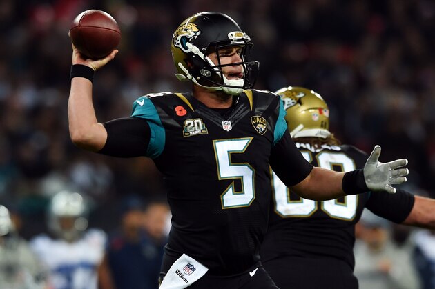 Jacksonville Jaguars quarterback Blake Bortles reaches back to throw during the second half of an NFL football game against the Dallas Cowboys at Wembley Stadium, London, Sunday, Nov. 9, 2014.  (AP Photo/Tim Ireland)