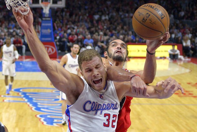 Los Angeles Clippers forward Blake Griffin, left, and Chicago Bulls center Joakim Noah battle for a rebound during the second half of an NBA basketball game, Monday, Nov. 17, 2014, in Los Angeles.   The Bulls won 105-89. (AP Photo/Mark J. Terrill)