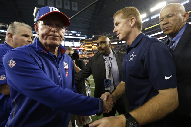 Dallas Cowboys head coach Jason Garrett, right, and New York Giants head coach Tom Coughlin shake hands after an NFL football game, Sunday, Oct.  19, 2014, in Arlington, Texas. (AP Photo/LM Otero)