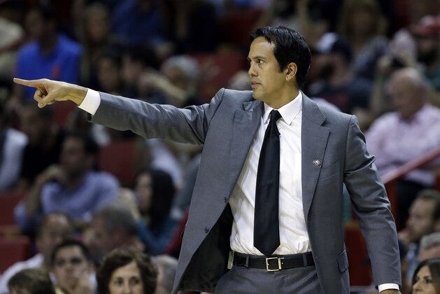 Miami Heat head coach Erik Spoelstra gestures in the second half of an NBA basketball game against the Indiana Pacers, Wednesday, Nov. 12, 2014, in Miami. The Pacers defeated the Heat 81-75. (AP Photo/Lynne Sladky)