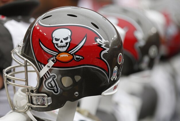 Nov 16, 2014; Landover, MD, USA; Tampa Bay Buccaneers players' helmets rest on heated posts on the bench against the Washington Redskins in the first quarter at FedEx Field. The Buccaneers won 27-7. Mandatory Credit: Geoff Burke-USA TODAY Sports