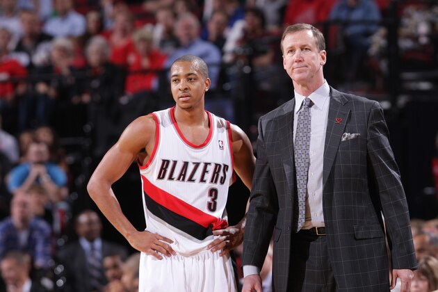 PORTLAND, OR - APRIL 16: C.J. McCollum #3 and head coach Terry Stotts of the Portland Trail Blazers speak during the game against the Los Angeles Clippers on April 16, 2014 at the Moda Center Arena in Portland, Oregon. NOTE TO USER: User expressly acknowledges and agrees that, by downloading and or using this photograph, user is consenting to the terms and conditions of the Getty Images License Agreement. Mandatory Copyright Notice: Copyright 2014 NBAE (Photo by Sam Forencich/NBAE via Getty Images)