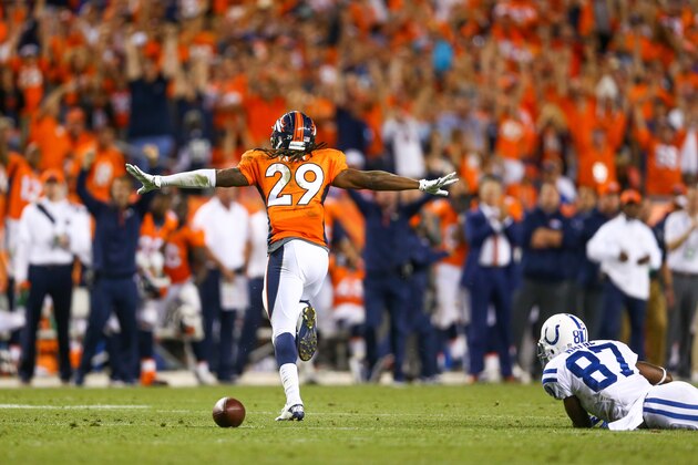 DENVER, CO - SEPTEMBER 7:  Cornerback Bradley Roby #29 of the Denver Broncos celebrates after the Indianapolis Colts went out on downs late in the fourth quarter of a game at Sports Authority Field at Mile High on September 7, 2014 in Denver, Colorado. Wide receiver Reggie Wayne #87 of the Indianapolis Colts lies on the ground after the Colts' last offensive play. (Photo by Jeff Gross/Getty Images)