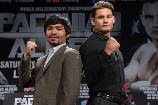 Sep 3, 2014; Los Angeles, CA, USA; Manny Pacquiao (left) and Chris Algieri pose at press conference at Hyatt Regency Century Plaza Hotel in advance of World Welterweight Championship bout on Nov. 22, 2014. Mandatory Credit: Kirby Lee-USA TODAY Sports
