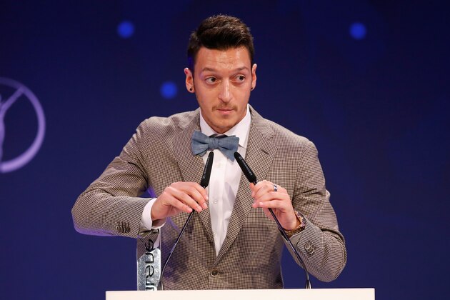 BERLIN, GERMANY - NOVEMBER 12:  Mesut Oezil , winner of the Laureus award for the biggest 	social commitment attends the Laureus Media Award 2014 at Grand Hyatt Hotel on November 12, 2014 in Berlin, Germany.  (Photo by Boris Streubel/Getty Images)