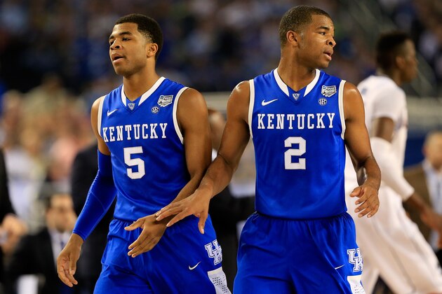 ARLINGTON, TX - APRIL 07: Andrew Harrison #5 and Aaron Harrison #2 of the Kentucky Wildcats react during the NCAA Men's Final Four Championship against the Connecticut Huskies at AT&T Stadium on April 7, 2014 in Arlington, Texas.  (Photo by Jamie Squire/Getty Images)