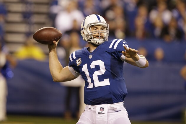 Indianapolis Colts quarterback Andrew Luck works against the New England Patriots during the second half of an NFL football game in Indianapolis, Sunday, Nov. 16, 2014. (AP Photo/Darron Cummings)