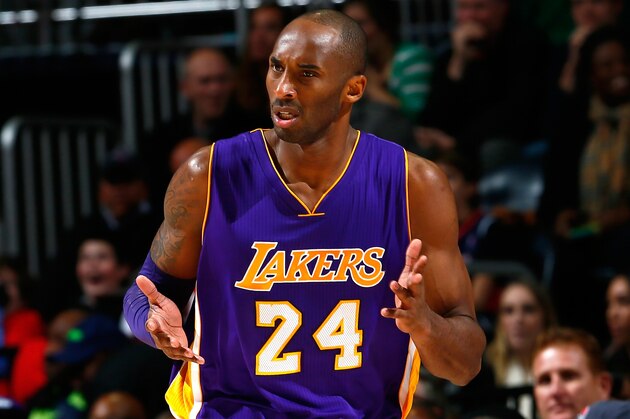 ATLANTA, GA - NOVEMBER 18:  Kobe Bryant #24 of the Los Angeles Lakers reacts after hitting a basket against the Atlanta Hawks at Philips Arena on November 18, 2014 in Atlanta, Georgia.  NOTE TO USER: User expressly acknowledges and agrees that, by downloading and or using this photograph, User is consenting to the terms and conditions of the Getty Images License Agreement.  (Photo by Kevin C. Cox/Getty Images)